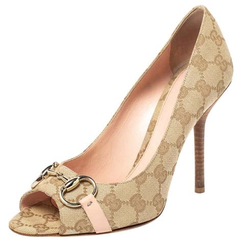 gucci kitty shoes|Gucci peep toe heels.